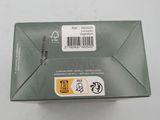 an open box of cigarettes sitting on top of a white table