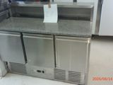 a refrigerator and freezer in a kitchen with a price tag on it