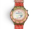 an image of a close up of a wrist watch on a white surface