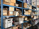 lots of boxes and boxes on the shelves in the warehouse