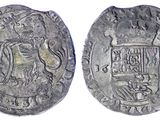 une pièce d'argent portant l'image d'un homme
