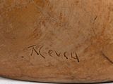 a close up of a wooden vase with writing on it