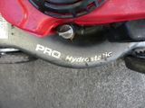 a close up of a red motorcycle with a gas tank on it