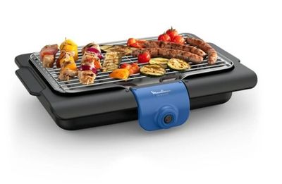 une photo d'un barbecue sur lequel sont disposés différents types d'aliments