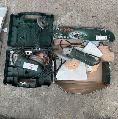 a box of tools that are sitting on the ground