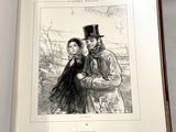 un livre ouvert sur lequel est dessiné un homme et une femme