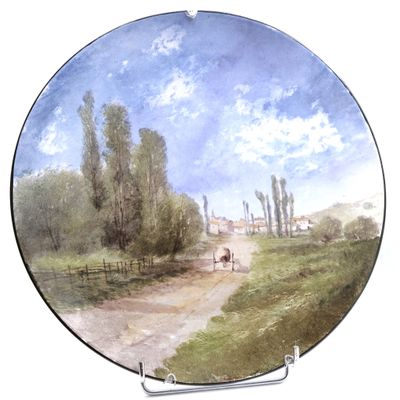 G. DELOYERE Grand plat en faïence polychrome à décor d'une p…