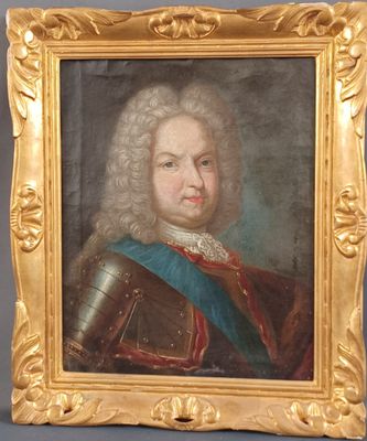 a painting of a man in armor in a gold frame