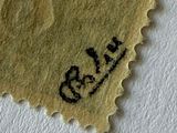 a close up of a piece of paper with a stamp on it