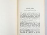 an open book with a black and white image of a man on a horse