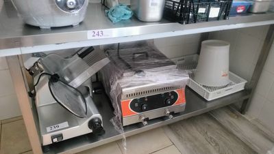 a shelf that has a bunch of items on it