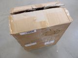 a cardboard box that is sitting on the floor