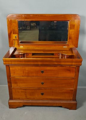an old wooden dresser with a mirror on top of it