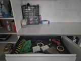 a drawer that has a bunch of items in it
