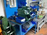many bins and boxes on the table in the room