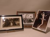 three framed photographs of a woman in a bathing suit and a picture of a man in a bathing suit