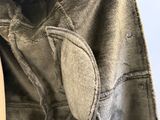 a close up of a person ' s jacket with a hood on