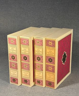three books are stacked on top of each other on a table