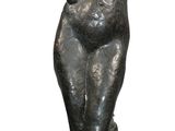 statue of a woman holding her head in her hands