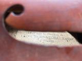 a close up of a piece of luggage with a label on it