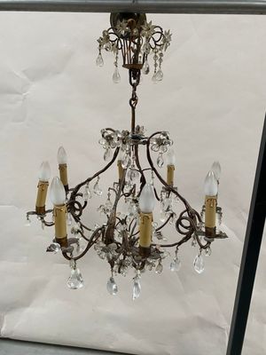 a chandelier that is hanging from the ceiling