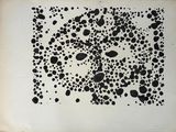 an old book with a black and white drawing on it