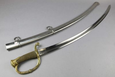 an image of a pair of swords sitting on top of a table
