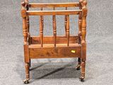 a small wooden bed with a wooden headboard and foot board