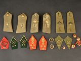 several different types of buttons are arranged in a row on a table
