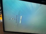 a computer screen that is sitting on a table