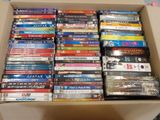 a lot of dvds in a box on the table