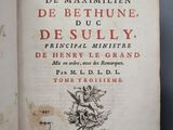 an open book with a picture of a man riding a horse