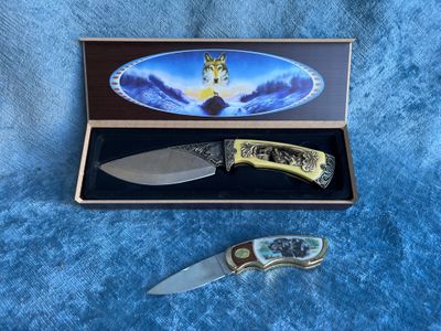 a knife in a box with a picture of a cat on it