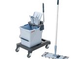 a close up of a mop and bucket on a cart