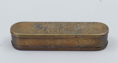 an old brass box with a floral design on it