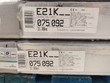 two boxes of electronic equipment are stacked on top of each other