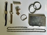 a lot of different items that are laying out on the table