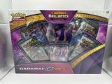 display box of pokemon trading cards featuring darkrai and charon