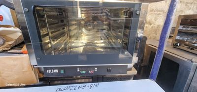 a large oven that is sitting inside of a kitchen