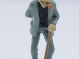 a figurine of a man with a hat and a cane