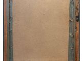 an old picture frame with a piece of paper in it