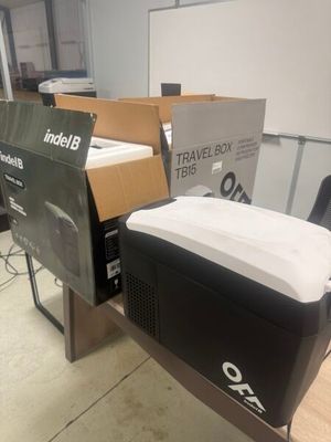 many boxes and boxes on a table in a room