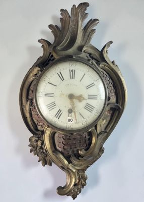 a clock that is hanging on the wall in the room