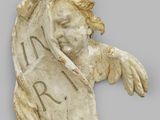 an image of a statue of an angel holding a sword