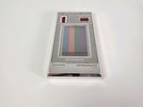 a picture of a small electronic device on a white surface