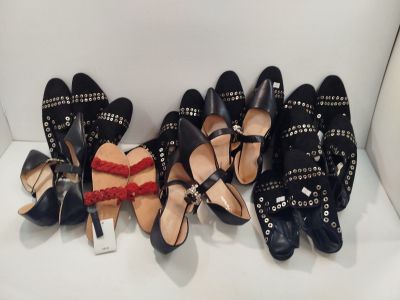 plusieurs paires de chaussures noires ornées de nœuds