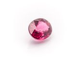 a pink tourmaline gems on a white background