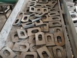 a lot of metal letters that are sitting in a box