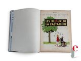 an open book with a picture of a man and a woman in a wheelchair