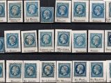 several different types of stamps are displayed on a black surface
